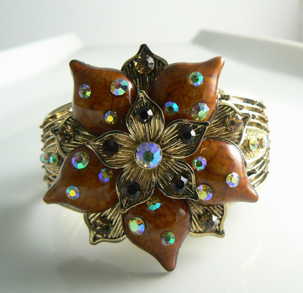 Gold tone rhinestone and enamel floral cuff bracelet