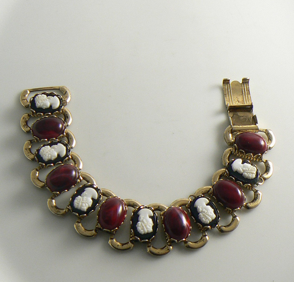 Bookchain bracelet with red cabochons and black cameos