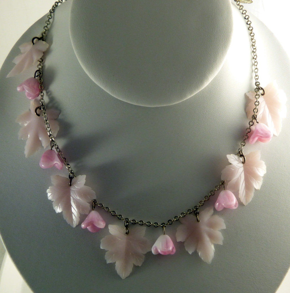 Vintage Miriam Haskell Pale Pink Leaf and Flower Charm Dangle Silver tone Necklace - Vintage Lane Jewelry