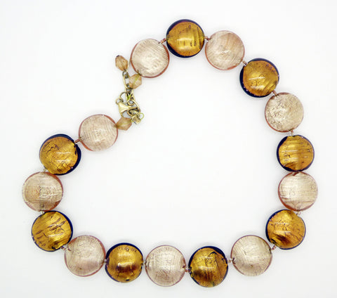 Czech glass amber necklace has prong set, open back, faceted glass squares