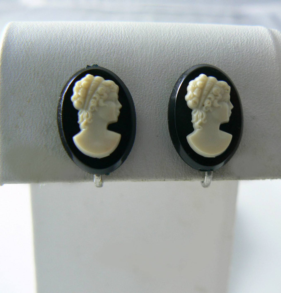 Black And White Celluloid Cameo Screw Back Earrings.
