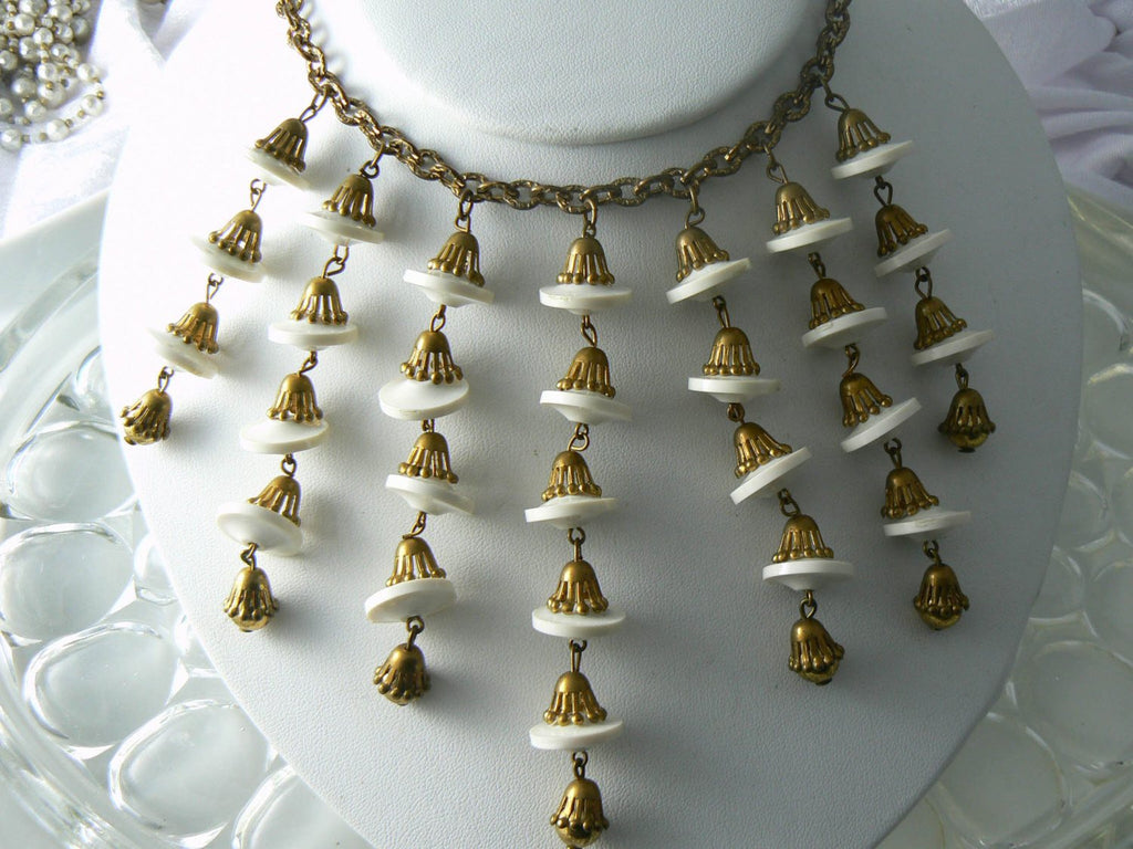 Antique brushed gold metal and white Lucite drop bib style necklace