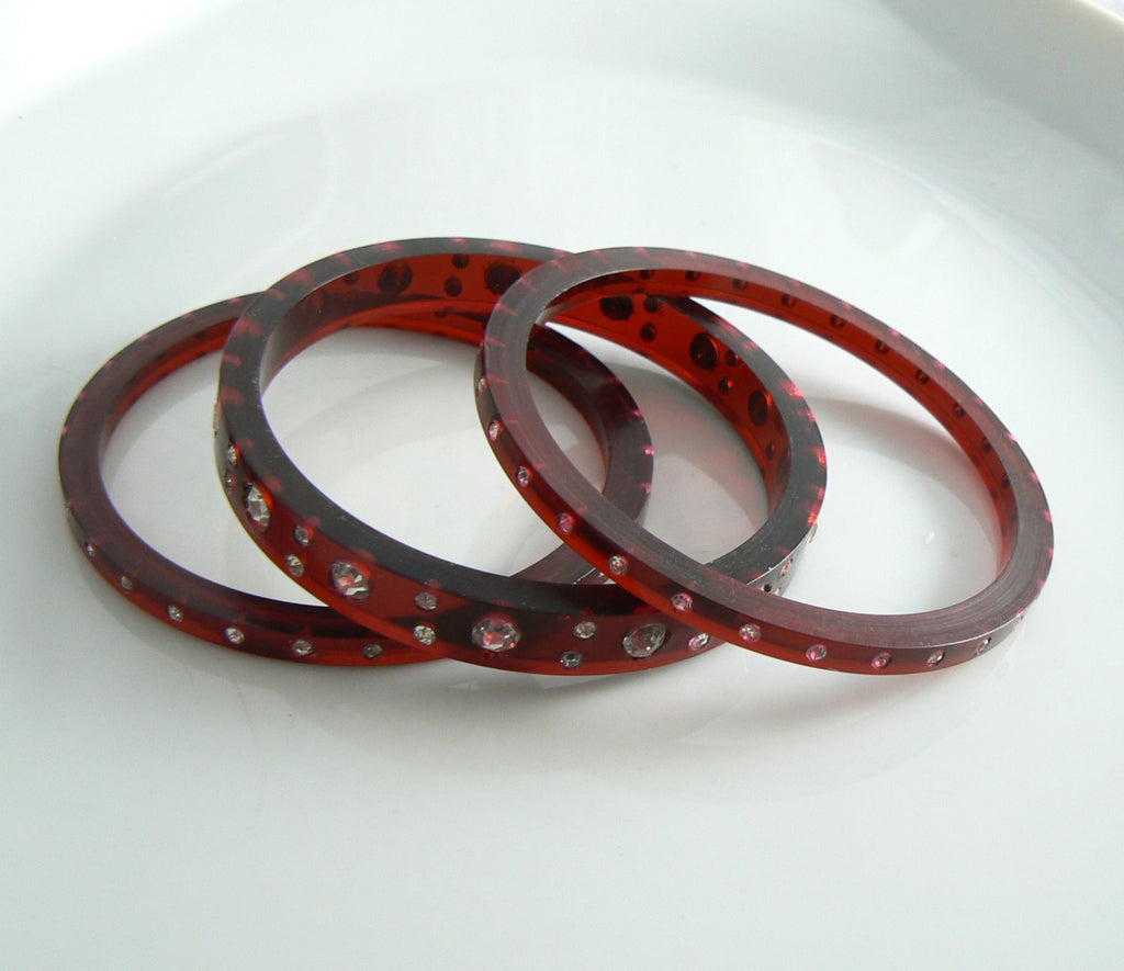 Vintage Cherry Juice Prystal Edge Cut Triple Bakelite Bangle with Rhinestones - Vintage Lane Jewelry
