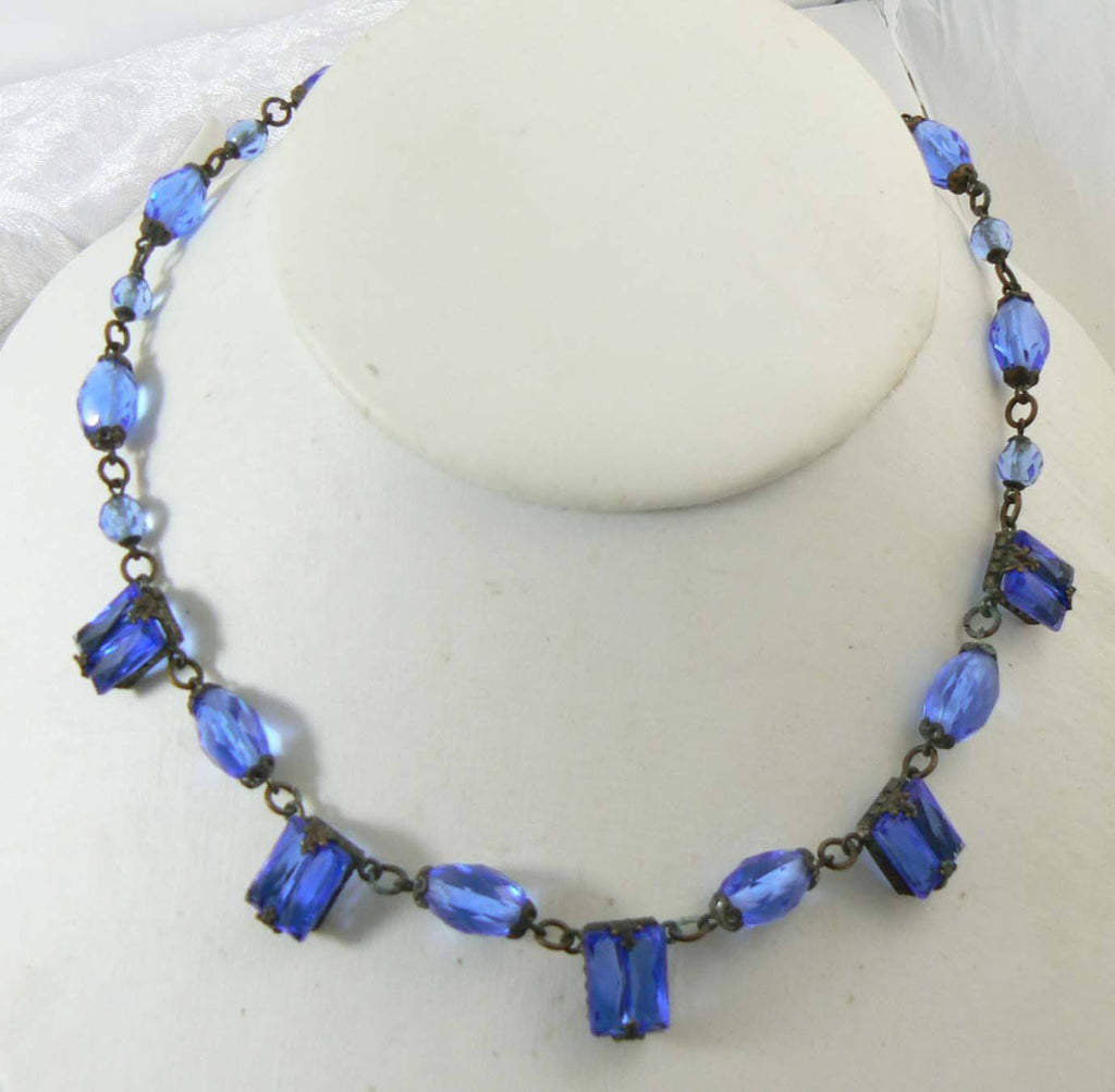 Art Deco blue step glass, brilliant cut glass and brass necklace - Vintage Lane Jewelry