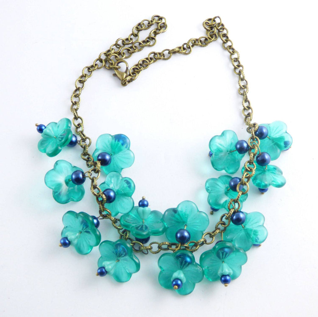 Glass Teal Colored Flowers with Dark Blue Beaded Brass Necklace