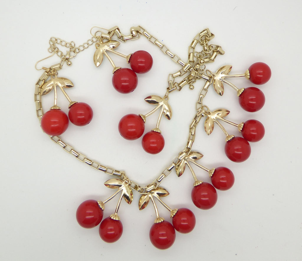 Red Cherries Parure Bib Fringe Necklace, Bracelet and Earrings, Lucite Cherries and Green Rhinestones - Vintage Lane Jewelry
