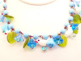 Glass Bird Blue Beaded Necklace with Glass Leaves, Glass flowers and Lucite flowers - Vintage Lane Jewelry