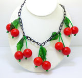 Cherry Bakelite Necklace, Black Celluloid Chain and Green Glass Leaves - Vintage Lane Jewelry