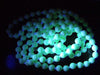 Art Deco Cream Uranium Glass Flapper Beads - Vintage Lane Jewelry