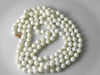 Art Deco Cream Uranium Glass Flapper Beads - Vintage Lane Jewelry