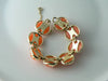 Signed Coro Soft Orange Apricot Thermoset Chunky Bracelet - Vintage Lane Jewelry