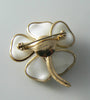 Crown Trifari Poured Glass White Flower Brooch. - Vintage Lane Jewelry