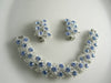 Lisner Blue Rhinestone White Enamel Flower Demi Parure - Vintage Lane Jewelry