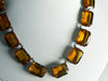 Vintage Art Deco Amber Glass Panel Necklace, emerald cut, prong set, open back stones - Vintage Lane Jewelry