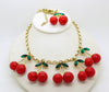 Red Cherries Parure Bib Fringe Necklace, Bracelet and Earrings, Lucite Cherries and Green Rhinestones - Vintage Lane Jewelry